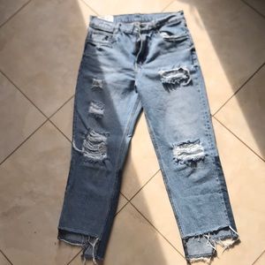 Distressed denim jeans